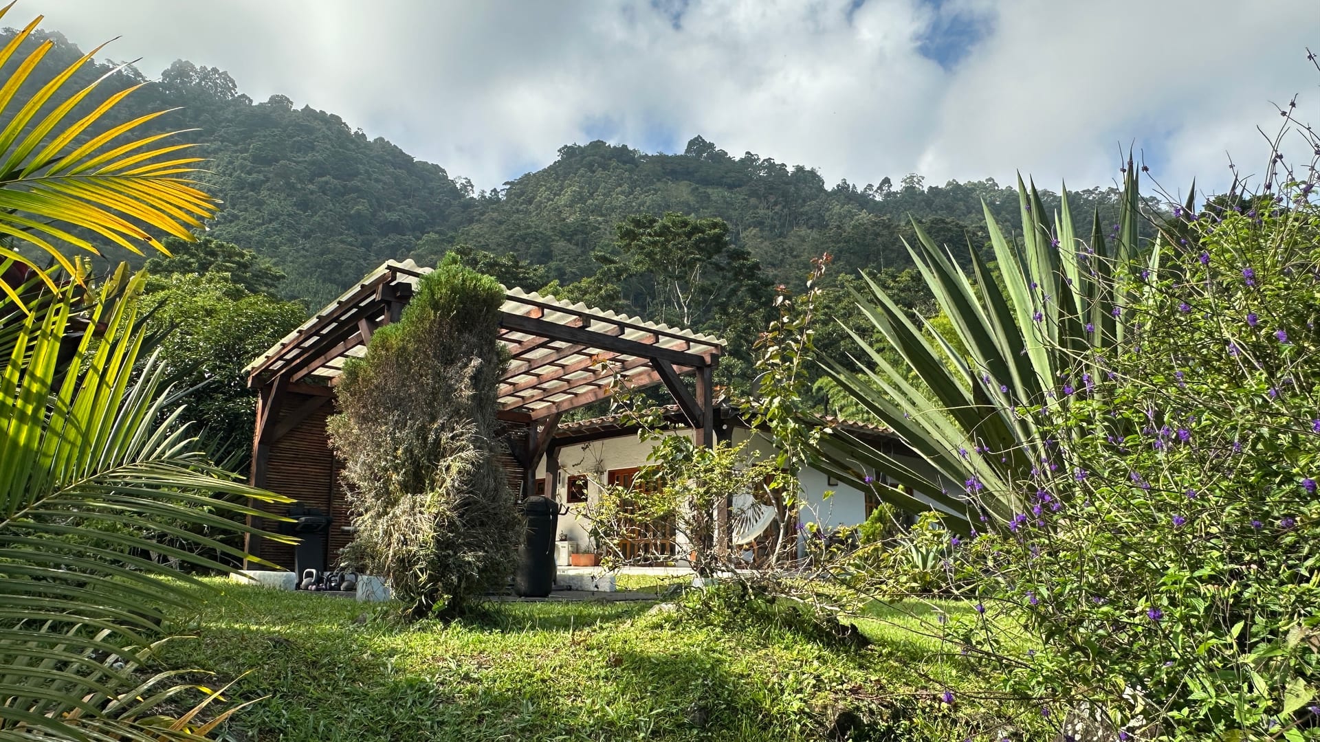 Pergola and garden entrance with cloud-forest mountain views